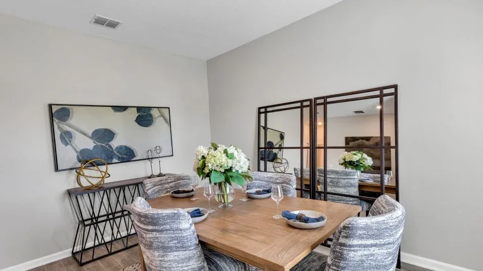 Sala de jantar do modelo Delray no Wellness Ridge Clermont FL, casa Lennar em Orlando para brasileiros