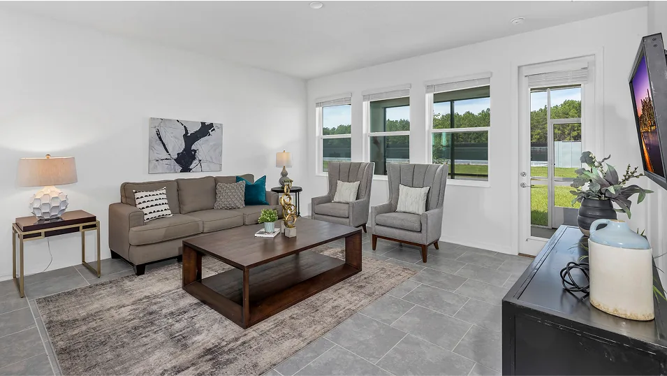 Sala de estar do modelo Aspen no Wellness Ridge Clermont FL, casa Lennar em Orlando para brasileiros