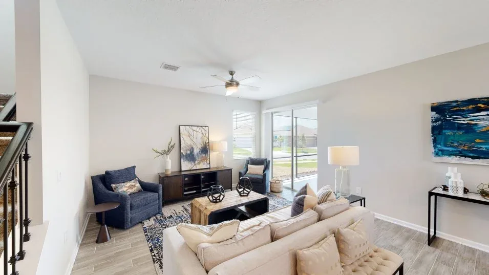 Sala de estar do modelo Delray no Wellness Ridge Clermont FL, casa Lennar em Orlando para brasileiros