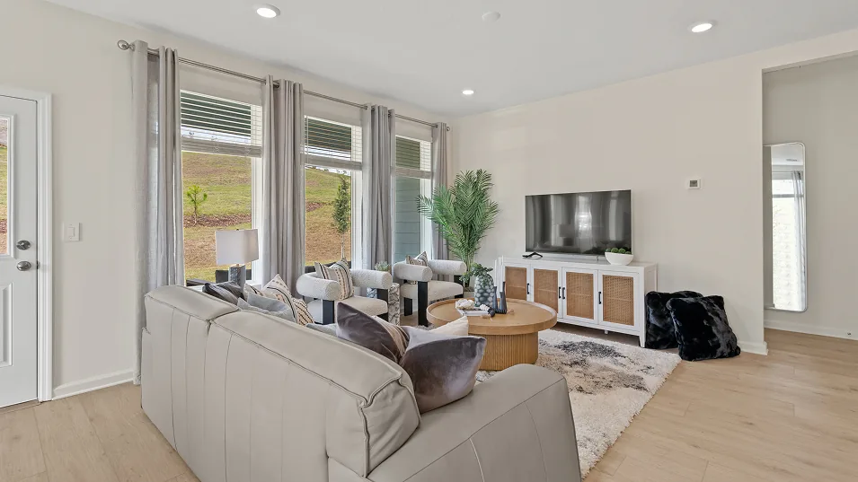 Sala de estar do modelo Steely no Wellness Ridge Clermont FL, casa Lennar em Orlando para brasileiros