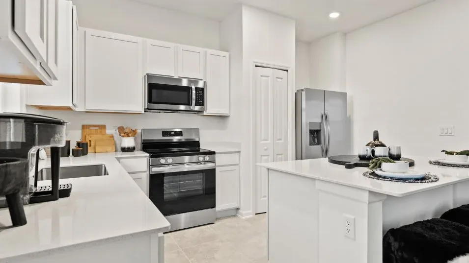 Cozinha do modelo Sienna no Wellness Ridge Clermont FL, casa Lennar em Orlando para brasileiros