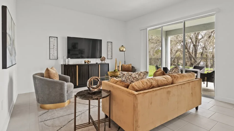 Sala de estar do modelo Riviera no Wellness Ridge Clermont FL, casa Lennar em Orlando para brasileiros