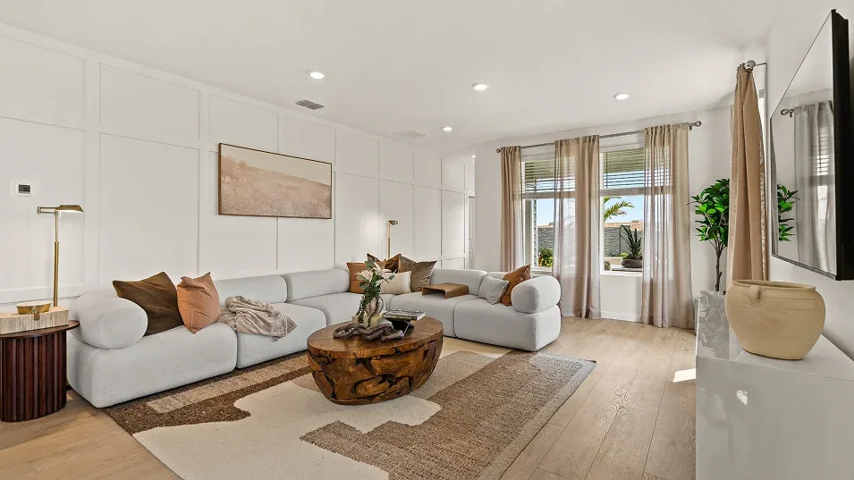 Sala de estar do modelo Santo no Wellness Ridge Clermont FL, casa Lennar em Orlando para brasileiros